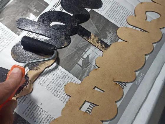 Pintura de las piezas de la base del cartel